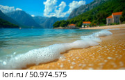 Serene Coastal Scene: Wavelets on a Sandy Beach with Mountain Background. Стоковое AI-изображение, AI-художник Данила Большаков / Фотобанк Лори