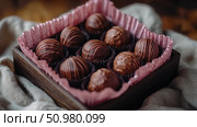 Box of Assorted Gourmet Chocolate Truffles: Indulge in a Selection of Rich, Dark Chocolate Delights. Стоковое AI-изображение, AI-художник Данила Большаков / Фотобанк Лори