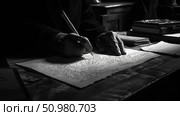 A person is sitting at a desk, writing on a piece of paper with a pen. Стоковое AI-изображение, AI-художник Данила Большаков / Фотобанк Лори