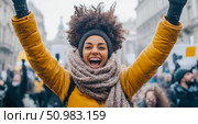 Joyful Woman Celebrating at a Winter Protest, Uplifted Arms, Afro Hair, Yellow Coat. Стоковое AI-изображение, AI-художник Данила Большаков / Фотобанк Лори