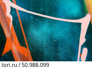 Vibrant Graffiti Art with Neon Orange and Teal for Urban 2000s Aesthetic. Стоковое фото, фотограф Александра Конопля / Фотобанк Лори