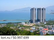 View from the mountain to the city of Nha Trang, Vietnam, with skyscrapers on the shore of the Gulf of the South China Sea. Стоковое фото, фотограф Сергей Фролов / Фотобанк Лори