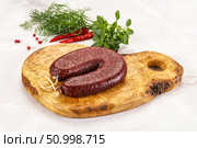 Delicious dry cured beef basturma on table, closeup. Стоковое фото, фотограф Андрей Старостин / Фотобанк Лори