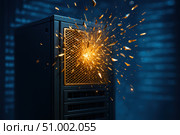 A Dramatic Explosion Emanating from a Computer Server with Bright Sparks Against a Background of Digital Code. Стоковое AI-изображение, AI-художник Башкирова Анна / Фотобанк Лори