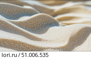 Sand patterns formed by wind in a desert location during bright daylight hours. Стоковое AI-видео, аниматор Сергей Толмачёв / Фотобанк Лори