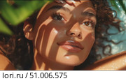 Natural beauty shines under tropical sunlight with soft shadows and glistening skin. Стоковое AI-видео, аниматор Сергей Толмачёв / Фотобанк Лори