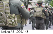 Military march of Colombian soldiers, combat-ready army unit, soldiers heading to conflict zone. Стоковое видео, видеограф ALEJANDRO PEREZ ALVARES / Фотобанк Лори