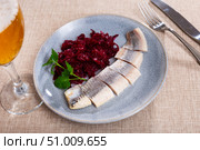 Lightly salted herring with beets served on platter. Стоковое фото, фотограф Яков Филимонов / Фотобанк Лори
