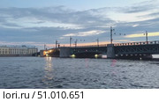 Palace Bridge in St. Petersburg at sunrise. Neva river and Palace (Dvortsovy) Bridge - symbol of St. Petersburg Russia. High quality footage for travel agencies, guides and tour operators. Стоковое видео, видеограф Ирина Михайличенко / Фотобанк Лори