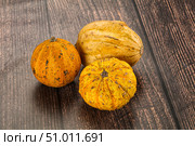 Decorative yelow pampkin seasonal vegetables. Стоковое фото, фотограф Андрей Старостин / Фотобанк Лори