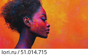 An artistic portrayal of a person with colorful face paint, highlighting unique features with a warm orange backdrop that enhances the vivid colors. Стоковое AI-видео, аниматор Данила Большаков / Фотобанк Лори