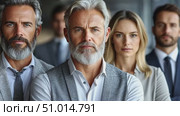 A group of business professionals engages in a strategic discussion in a contemporary office environment, showcasing teamwork and leadership. Стоковое AI-видео, аниматор Данила Большаков / Фотобанк Лори
