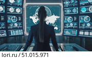A skilled analyst interprets complex data displayed on numerous screens, showcasing technical expertise in a modern control room environment. Стоковое AI-видео, аниматор Данила Большаков / Фотобанк Лори