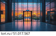 Witness a stunning sunset reflecting through sleek glass walls in an urban landscape, creating a serene and beautiful ambiance during twilight. Стоковое AI-видео, аниматор Данила Большаков / Фотобанк Лори