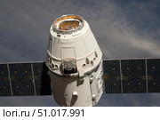 The SpaceX Dragon commercial cargo craft. Стоковое фото, фотограф Stocktrek Images, Inc. / ТАСС / Фотобанк Лори