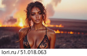 A breathtaking model showcases confidence and beauty against a backdrop of fiery volcanic eruptions at sunset, creating a striking contrast. Стоковое AI-видео, аниматор Данила Большаков / Фотобанк Лори