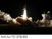 Space shuttle Discovery lifts off from Launch Pad 39A at Kennedy Space Center in Florida, on the STS-131 mission. Стоковое фото, фотограф Stocktrek Images, Inc. / ТАСС / Фотобанк Лори