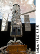The Hubble Space Telescope is released from the cargo bay of Space Shuttle Atlantis. Стоковое фото, фотограф Stocktrek Images, Inc. / ТАСС / Фотобанк Лори