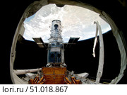The Hubble Space Telescope, locked down in the cargo bay of Space Shuttle Atlantis. Стоковое фото, фотограф Stocktrek Images, Inc. / ТАСС / Фотобанк Лори