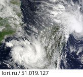 Tropical Cyclones Eric and Fanele approaching Madagascar. Стоковое фото, фотограф Stocktrek Images, Inc. / ТАСС / Фотобанк Лори