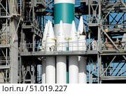 Solid rocket boosters are attached to the Delta II rocket in the mobile service tower. Стоковое фото, фотограф Stocktrek Images, Inc. / ТАСС / Фотобанк Лори