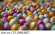 Collection of differently colored eggs stacked together in a pile. Стоковое AI-видео, аниматор Данила Большаков / Фотобанк Лори
