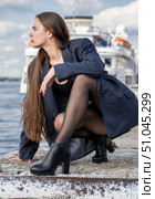 Full length portrait of a young brunette in a formal jacket and black tights. Стоковое фото, фотограф Андрей Аркуша / Фотобанк Лори