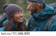 Couple enjoys hiking adventure in scenic mountain landscape, sharing smiles and moments together. Стоковое AI-видео, аниматор Сергей Толмачёв / Фотобанк Лори