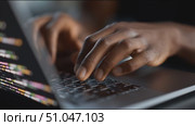 Coding session in a dimly lit workspace showing focus and creativity. Стоковое AI-видео, аниматор Сергей Толмачёв / Фотобанк Лори