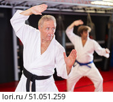 Man with other athletes of different ages during karate classes. Стоковое фото, фотограф Яков Филимонов / Фотобанк Лори