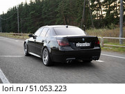 KRASNOYARSK, RUSSIA - July 31, 2025: Black BMW M5 E60. Редакционное фото, фотограф Плотников Дмитрий / Фотобанк Лори