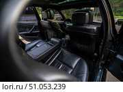 KRASNOYARSK, RUSSIA - July 31, 2025: Black BMW M5 E60. Редакционное фото, фотограф Плотников Дмитрий / Фотобанк Лори