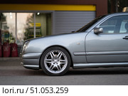 KRASNOYARSK, RUSSIA - July 31, 2025: Silver Mercedes Benz E class W210. Редакционное фото, фотограф Плотников Дмитрий / Фотобанк Лори