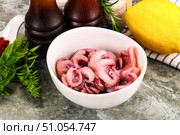 Marinated baby octopus snack appetizer. Стоковое фото, фотограф Андрей Старостин / Фотобанк Лори