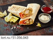 Eastern traditional shawarma with sauces. Стоковое фото, фотограф Ирина Буракова / Фотобанк Лори