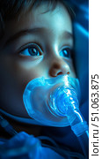 Young Child Receiving Medical Care in a Hospital Room With a Respirator During Early Morning Hours. Стоковое AI-изображение, AI-художник Юлия Гапеенко / Фотобанк Лори
