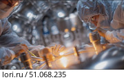 Scientists conduct experiments in a clean room using advanced equipment to explore new materials and technologies. Стоковое AI-видео, аниматор Сергей Толмачёв / Фотобанк Лори