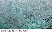 Open Ocean Water with Small Ripples and Sunlight Sparkles. Стоковое видео, видеограф Marina Gabdullina / Фотобанк Лори