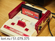 Moscow, Russia - May 7, 2022: Museum of Old Yandex Computers. Tetris game for an old console. Редакционное фото, фотограф Наталия Кирсанова / Фотобанк Лори