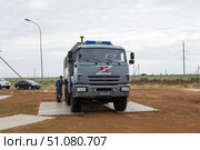Специальный военный грузовик на шасси КАМАЗ, с частичным бронированием, военный автобус. Средняя Ахтуба, Волгоградская область, Россия. (2022 год). Редакционное фото, фотограф Андрей Цыганков / Фотобанк Лори