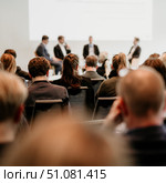 Interview and round table discussion at business convention and presentation. Audience at the conference hall. Business and entrepreneurship symposium. Стоковое фото, фотограф Matej Kastelic / Фотобанк Лори