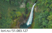 Aerial view of Blue Falls waterfall in lush green jungle of Costa Rica. Стоковое видео, видеограф Ольга Сухарева / Фотобанк Лори