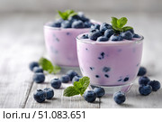 Fresh Berry Trifle in Glasses. Dessert with Blueberries and Whipped Cream. Layered Yogurt with Berry Fruits. Berry Pudding Glass Jars. Food Marketing, Recipe Design. Colorful Sweet Treat. Fruity Quark. Стоковое AI-изображение, AI-художник Марина Демидюк / Фотобанк Лори