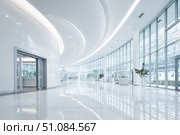 Empty corridor in modern Hospital ICU blurred background. Blur defocused interior of modern clinic. Abstract defocused corridor of medical centre, laboratory, lab. Healthcare and medicine concept. Стоковое AI-изображение, AI-художник Марина Демидюк / Фотобанк Лори