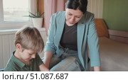 Mom education son writing. Kids learn and study in home school. Mommy female helping teaching little boy support studying, learning homework. Child care teach study. Knowledge day. Children schooling. Стоковое видео, видеограф Марина Демидюк / Фотобанк Лори