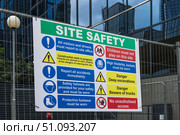 Large Site Safety Construction Sign with PPE Warnings and Access Rules, Urban Worksite. Стоковое фото, фотограф Zydrius Tartenis / Фотобанк Лори