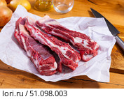 Raw beef brisket served at table. Стоковое фото, фотограф Яков Филимонов / Фотобанк Лори