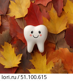Tooth in Fall Leaves. Стоковое AI-изображение, AI-художник Павлов Максим / Фотобанк Лори
