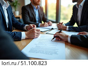 A group of businessmen and lawyers discusses contract documents, consultation. Стоковое AI-изображение, AI-художник ketpro.design / Фотобанк Лори