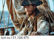 Serious pirate captain wearing tricorn hat on sailboat during golden hour. Стоковое AI-изображение, AI-художник Иван Рябоконь / Фотобанк Лори
